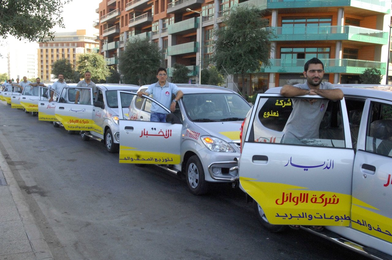 Press delivery vans on a Beirut street
