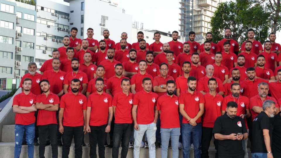 The team in red uniforms