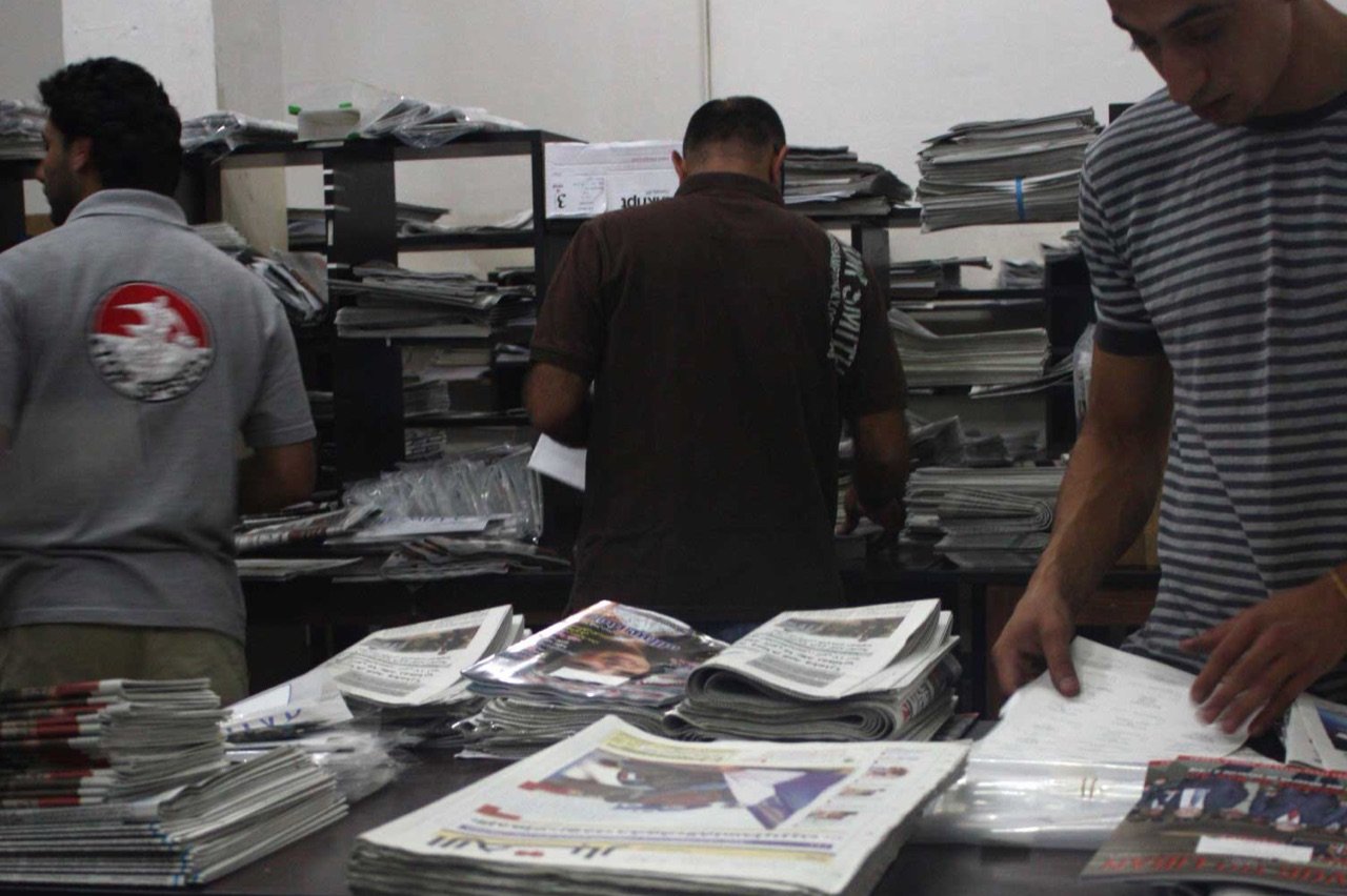 Sorting newspapers