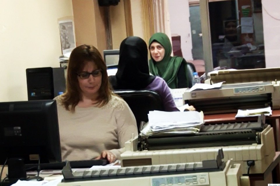 Staff at their desks